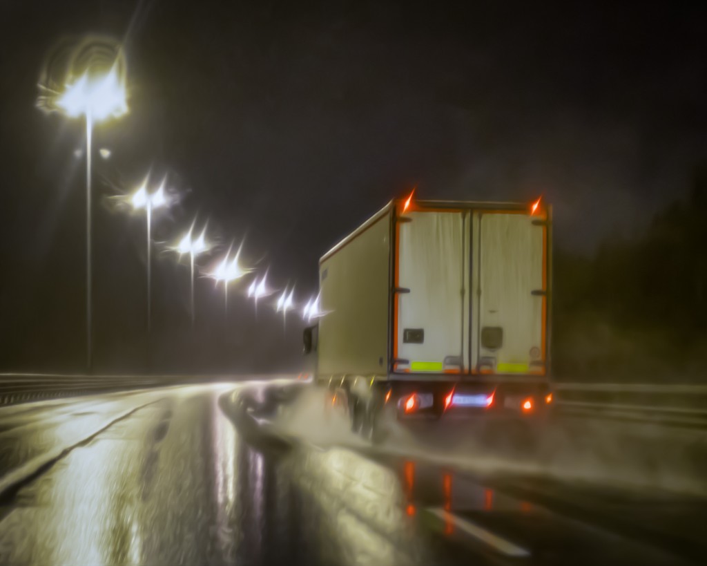 Truck on the road at night