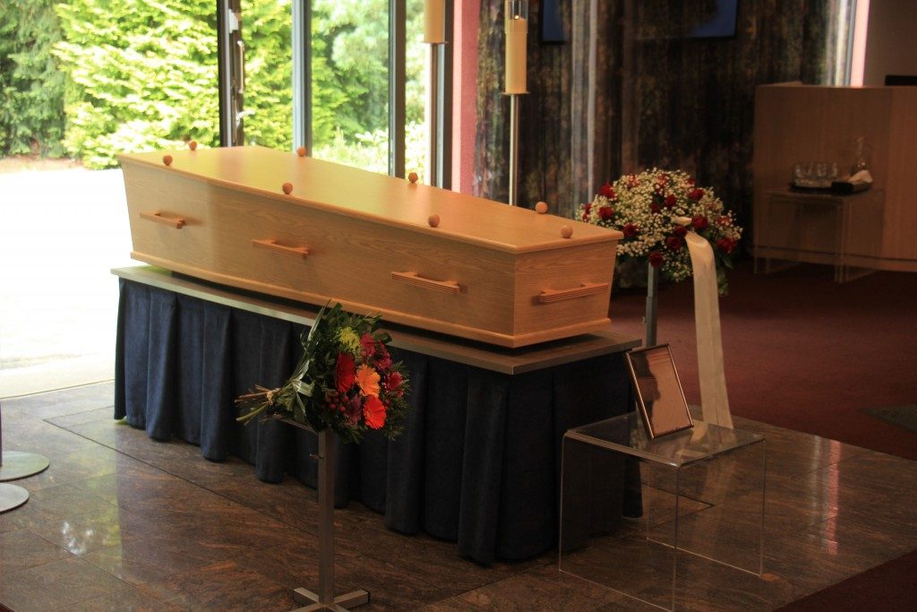 wooden casket inside a church