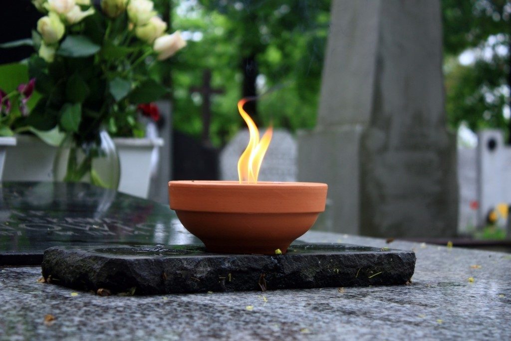 candle at a graveyard