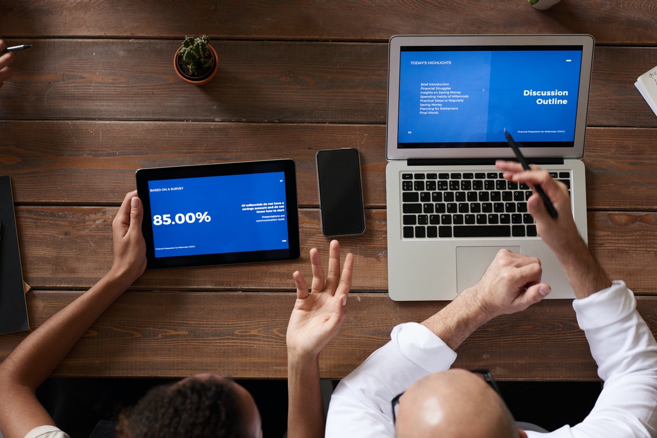 people discussing slides