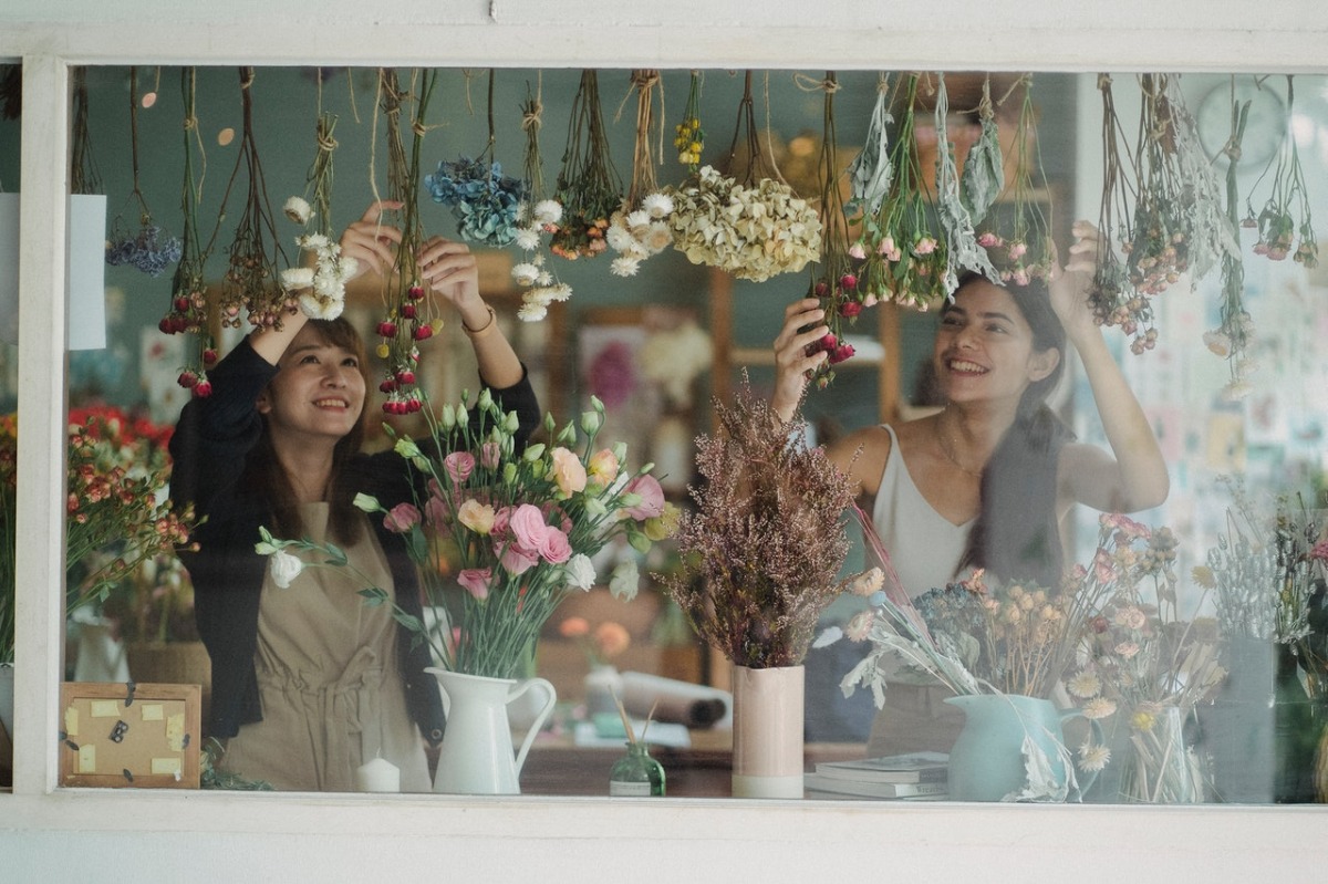 women organizing flowers