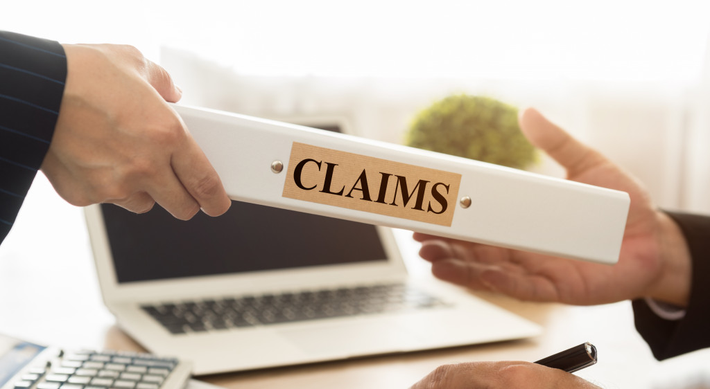 lawyer filing claims to insurance company