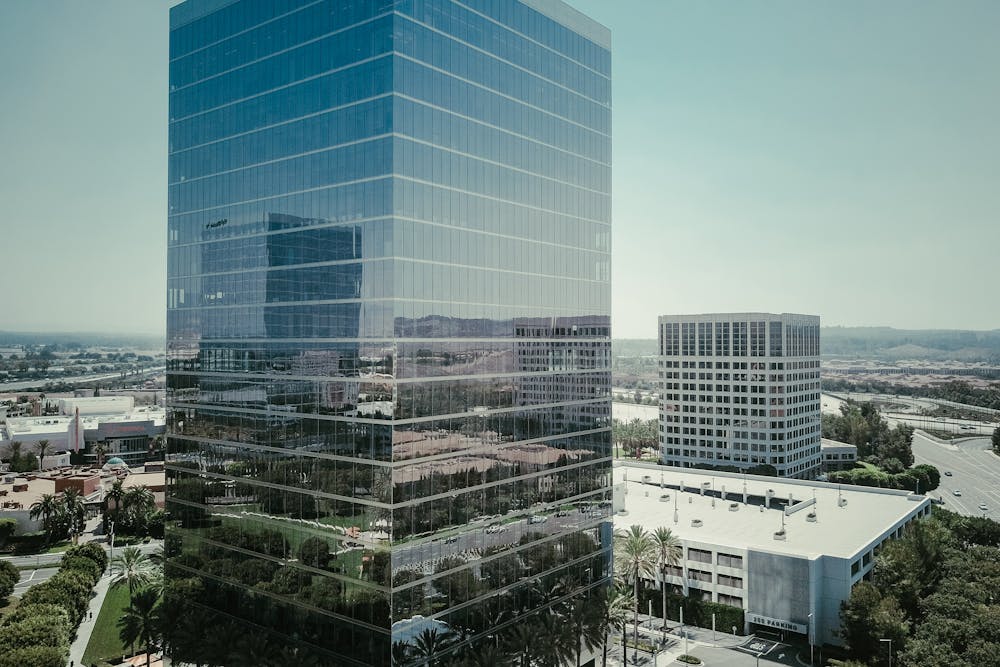 a skyscraper with reflective glass walls