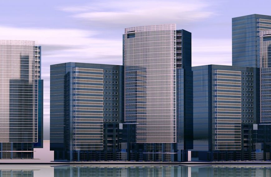 skyscrapers in front of a body of water