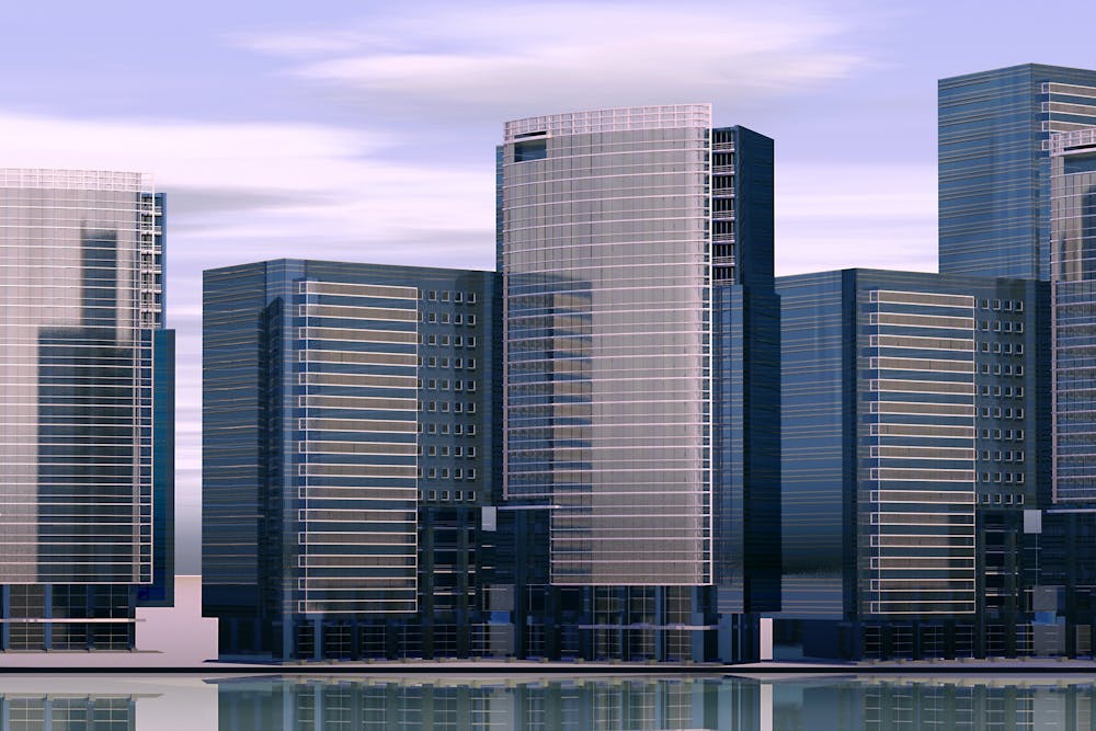 skyscrapers in front of a body of water